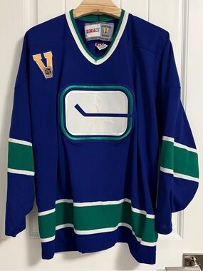 Authentic CCM Vancouver Canucks Stick In Rink Blue Jersey Size XXL 2XL